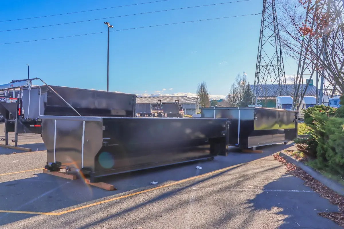Roll-off dumpster ready for waste disposal at job site for 2 Yard Dumpster Rental in Magnolia